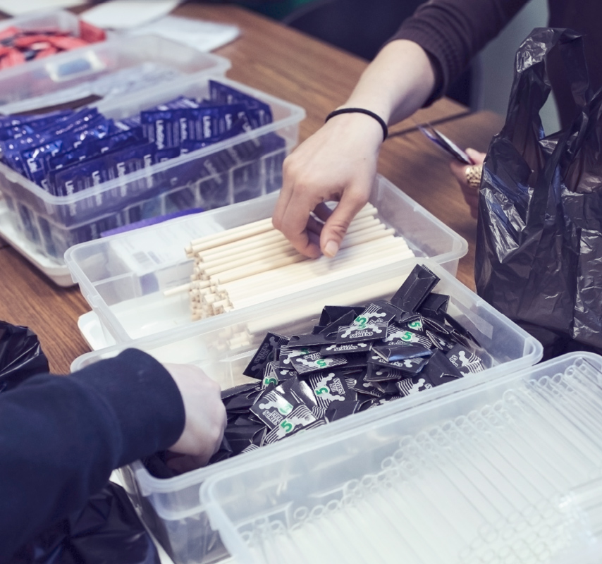 Sistering Volunteer distributing goodies