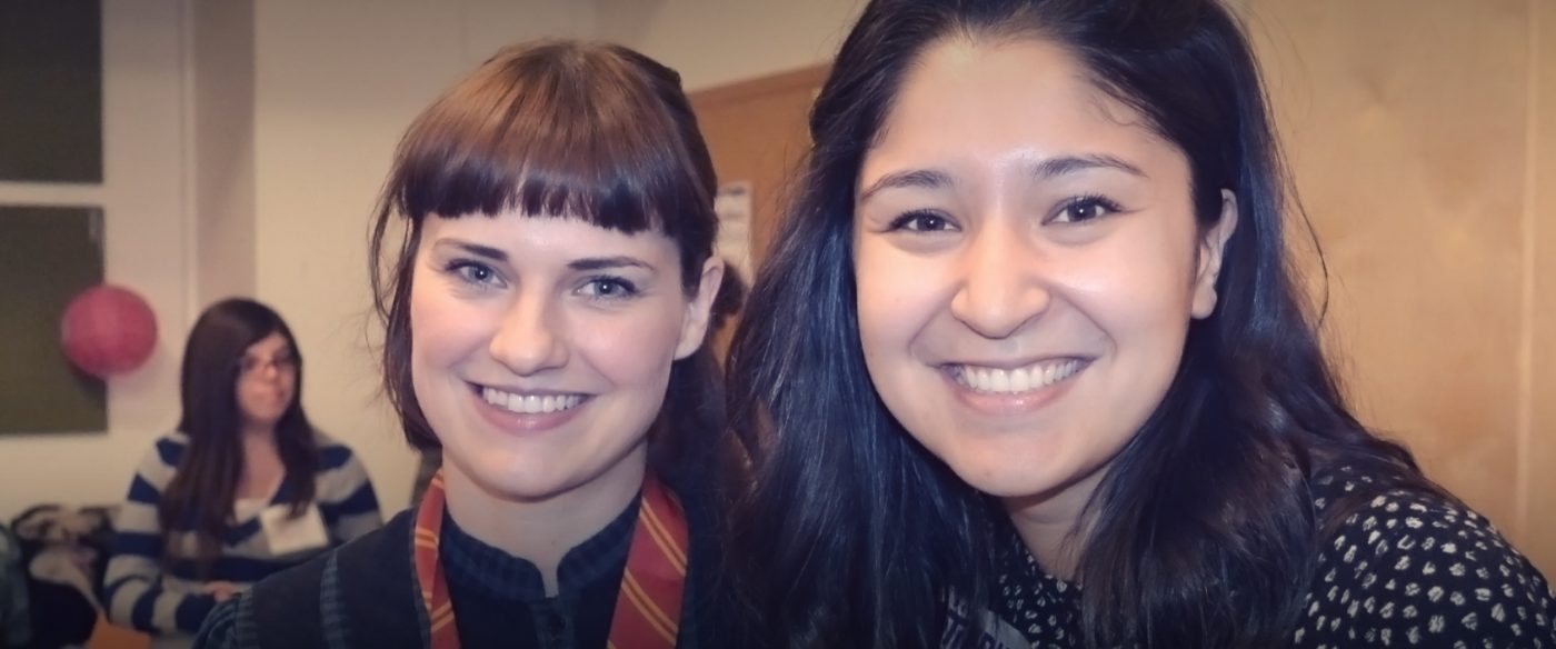 Portrait of 2 women smiling