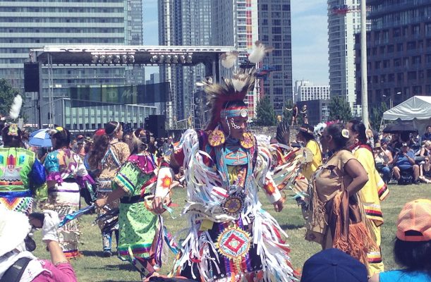 Person wearing an indigenous outfit